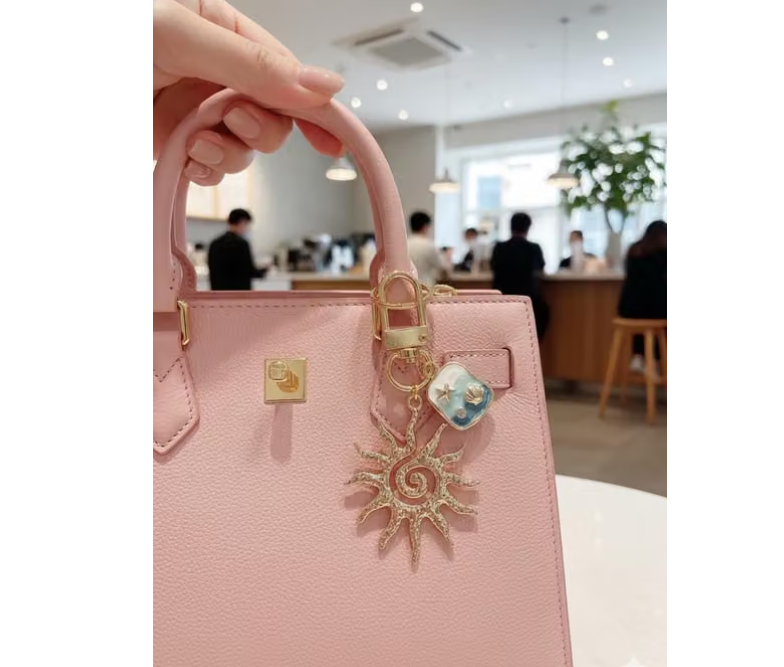 Golden Sun Bag Charm, Zipper Pull, Bag Clip Pearl Clear Phone Case + Pearls Wristlet | Phone Charms | iPhone Cases